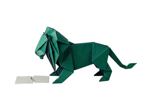Paper-craft lion standing before a contract torn in two